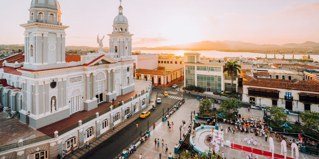 A panoramic view of Santiago de Cuba, featuring the Cathedral of Our Lady of Immaculate Conception and Parque Céspedes.