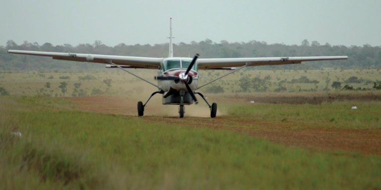 Airplane used for scenic flights on the Three Guyana's tour, highlighting the travel logistics and remote destinations.
