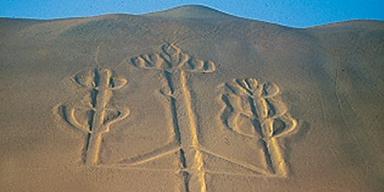 The Paracas Candelabra geoglyph, a large three-branched figure etched into the desert hillside.