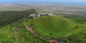 Aerial view of Hotel Pikaia, showing its unique architecture and lush surroundings