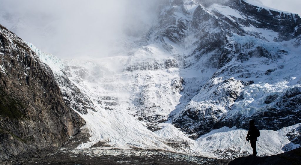 A scenic view of the Paine Massif and a glacier in Torres del Paine National Park, Chile.