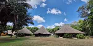 Traditional accommodations at a lodge featured on the Three Guyana's tour, highlighting the unique lodging experience.