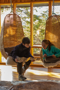 Two guests planning activities at Patagonia Camp
