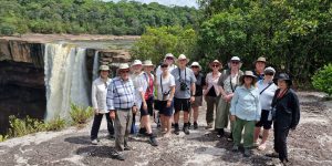 Group of travellers in Kaieteur Falls during 2024 Guyana Group Tour