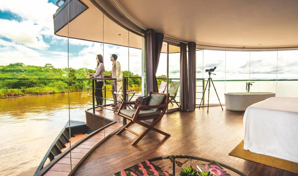 MV Zafiro cabin with guests on the Amazon River