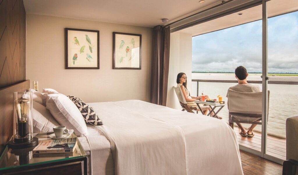 MV Zafiro cabin with guests on the Amazon River