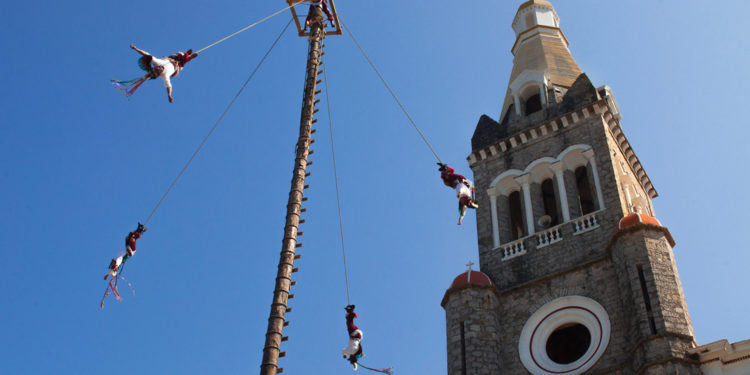 Voladores next to Church in Cuetzalan, Puebla.